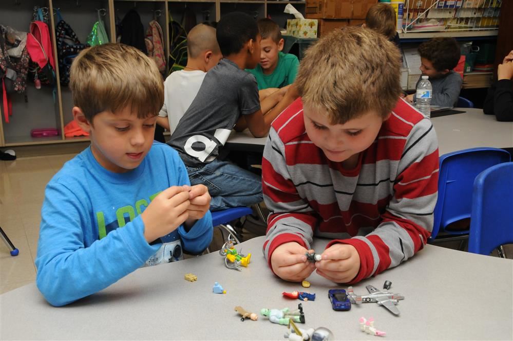 2 boys working on a project